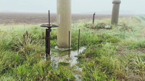 An irrigation valve leaking from damaged... | Stock Video | Pond5