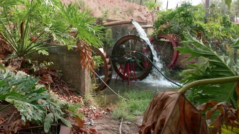Irrigation water pump is run by a small watermill Stock Footage 166894137