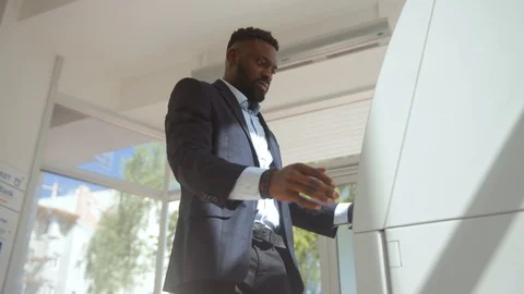 Irritated bank client having problem with ATM credit card got stuck inside the Stock Footage 110448190