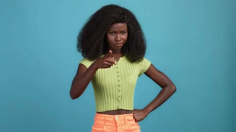 Irritated lady hooligan warn enemy punch isolated blue color background Stock Footage 166903094