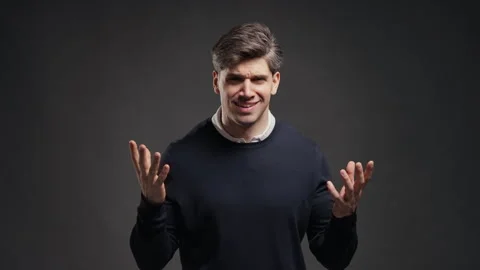 Irritated man showing what gesture, Gesturing Disbelief, Asking What Mad. Quarre Stock Footage 346494261