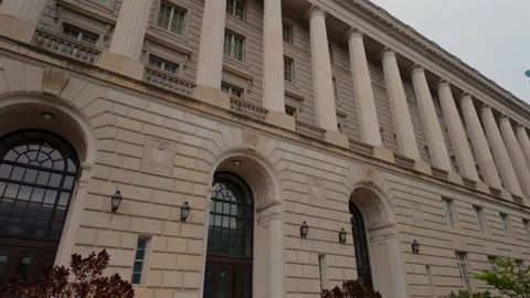 IRS Building Washington D.C. with Flag and Columns Stock Footage 319643482