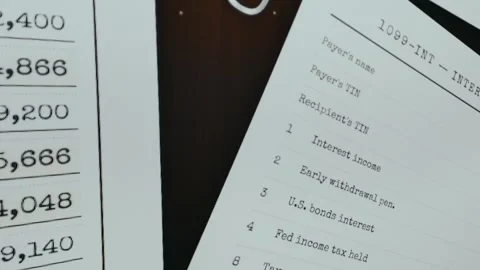 IRS Form 1099-INT for reporting interest income Stock Footage 333445618