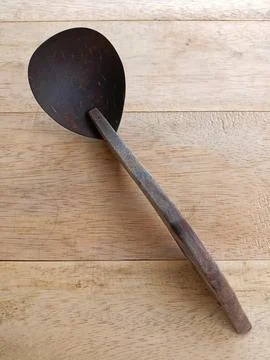 Irus Coconut Shell or Vegetable Spoon Stock Photos