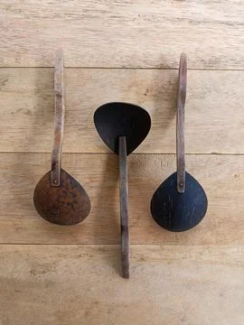 Irus Coconut Shell or Vegetable Spoon Stock Photos