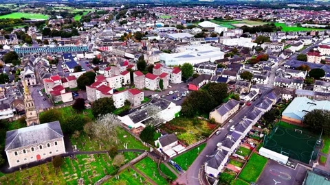 Irvine Town Centre with Streets, Buildings and Residential areas, Aerial Stock Footage 344033894