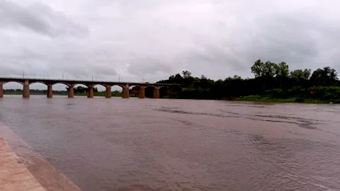Irwin bridge at evening time during rainy season from krishna river bank. Stock Footage 138325762