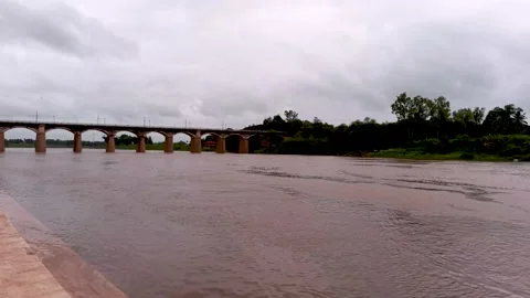 Irwin bridge at evening time during rainy season from krishna river bank. Stock Footage 138327073