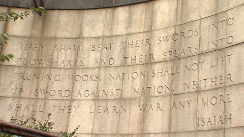 Isaiah text UN building close Stock Footage 128902363