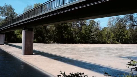 The Isar river in flood under a bridge Stock Footage 108747167