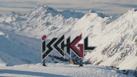 Ischgl sign on slopes in Winter with snow-capped mountains in the background Video stock 232123109