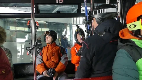 ISCHGL SKIERS GET READY ON CABLE CAR Stock Footage 121479991