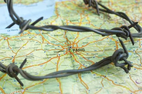 ISIL Crisis Paris Map SOFIA, BULGARIA - NOVEMBER 24: Atlas World map and r... Stock Photos