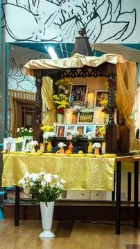 ISKCON devotees prepare altar with offerings as act of spiritual practice Stock Photos