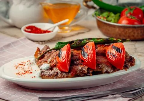 Iskender kebab on the table Stock Photos