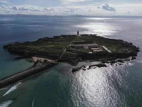 Isla de las Palomas exploring coastal defense and lighthouse in Tarifa Stock Photos