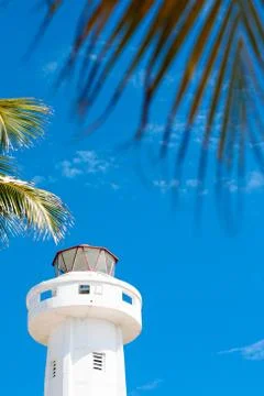 Isla Mujeres Lighthouse with Tropical Palm Trees Stock Photos