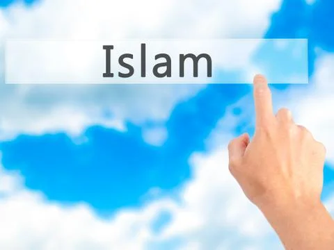 Islam - Hand pressing a button on blurred background concept on visual screen Stock Photos
