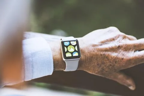 Islam?c pray application on smart watch touchscreen Stock Photos