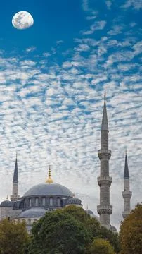 Islamic background with Blue Mosque and moon under a cloud-filled sky, Istanb Stock Photos