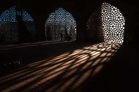 Islamic concept photo. Islamic pattern on the window and shadows on the groun Foto stock