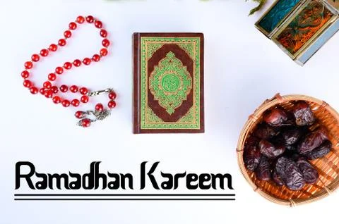 An islamic concept for Ramadhan. Flat lay composition of Qoran, Dates and a t Stock Photos
