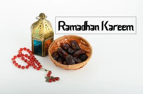 An islamic concept for Ramadhan. Flat lay composition of Qoran, Dates and a t Stock Photos