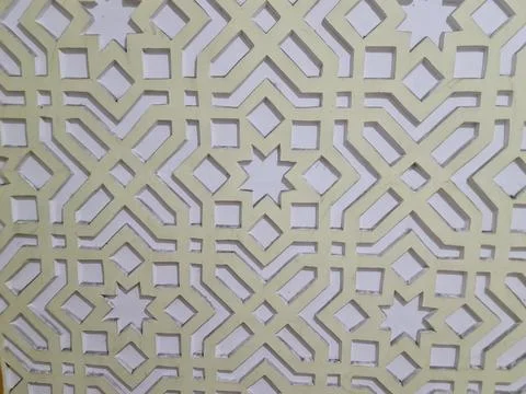 Islamic Geometric Star Pattern on Decorative Carved Wall Panel Stock Photos