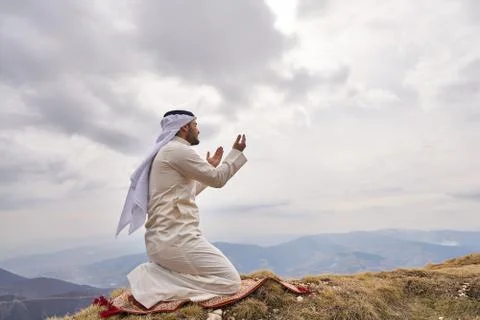 Islamic man praying Stock Photos
