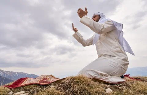 Islamic man praying Stock Photos