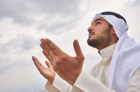 Islamic man praying Stock Photos