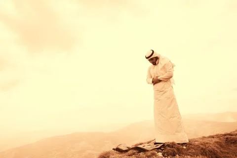 Islamic man praying Stock Photos
