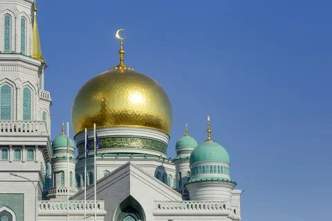 Islamic mosque on a blue sky background. The main cathedral mosque of Muslims in Stock Photos