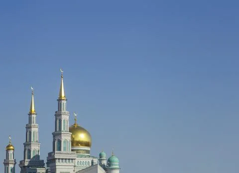 Islamic mosque on a blue sky background. The main cathedral mosque of Muslims in 스톡 사진
