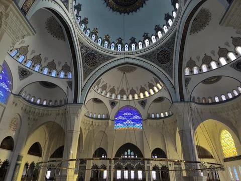 Islamic mosque interior with domes and ornate arches Stock Photos