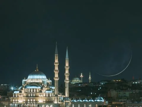 Islamic or ramadan concept background. Mosques and crescent moon at night Fotos Stock