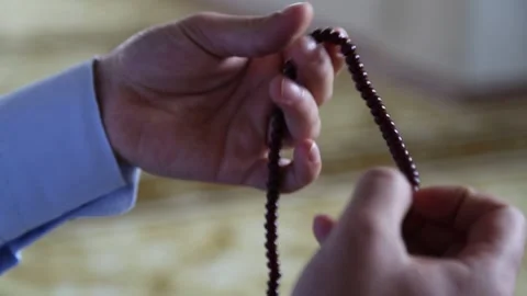 Islamic Prayer with Tasbih in Mosque Close Up Video stock 346474261