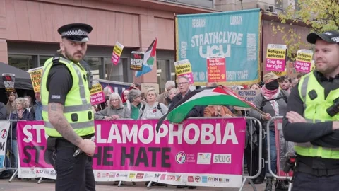 Islamophobia Banners, Stop Hate Speech, Event Policing, Protest Crowd Stock Footage 318152237