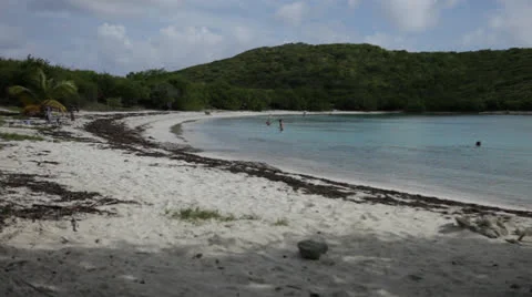 Island beach activity, 60% Stock Footage 24390429