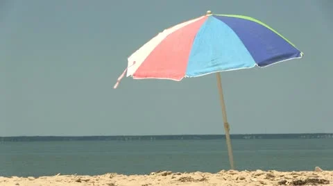Island beach umbrella; 2 Stock Footage 12280995