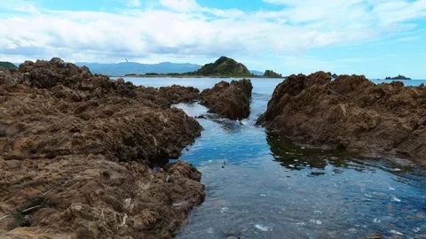 Island Beyond Rock Pool Видео 260850319