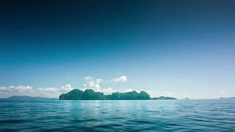 Island from a boat Stock Footage 197364424