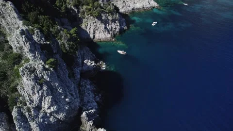 Island capri view from a drone to the bay with a boat Stock-Footage 231916196