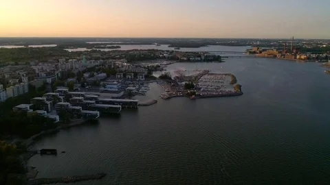 Island cityscape, Aerial backward view of lauttasaari island, on a sunny summ Stock Footage 94186653