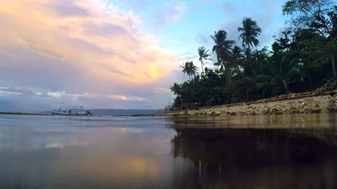 Island coast with sunset sky  Stock Footage 89322906