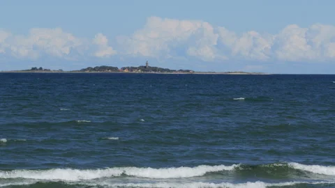 Island lighthouse over baltic sea Stock Footage 343875010