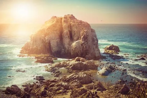 Island in ocean Stock Photos