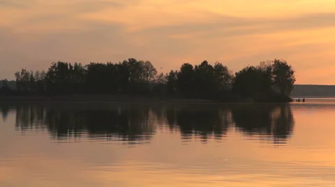 Island on a river at sunset Video stock 55878296