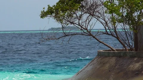 Island Scenery With Waves Passing By Stock Footage 125664204
