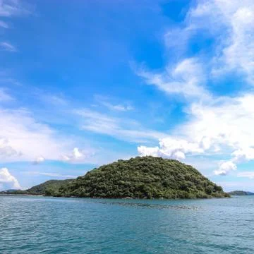 Island on sea with cloud Stock Photos
